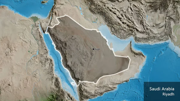Suudi Arabistan sınır bölgesinin uydu haritasında koyu bir örtüyle işaretlenmiş yakın çekimi. Ana nokta. Ülke çapında parıldıyor. Ülkenin ve başkentinin İngilizce adı