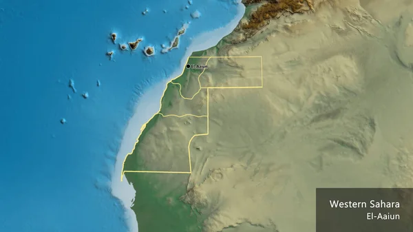 Close-up of the Western Sahara border area and its regional borders on a relief map. Capital point. Outline around the country shape. English name of the country and its capital