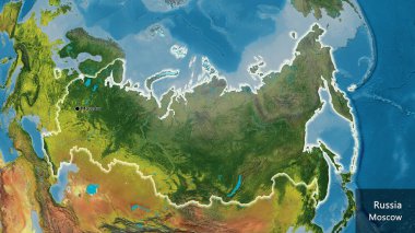 Bir topografik haritada Rusya sınır bölgesinin yakın çekimleri. Ana nokta. Ülke çapında parıldıyor. Ülkenin ve başkentinin İngilizce adı
