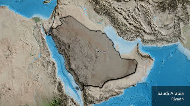 Suudi Arabistan sınır bölgesinin uydu haritasında koyu bir örtüyle işaretlenmiş yakın çekimi. Ana nokta. Kırsal kesimin kıvrımlı kenarları. Ülkenin ve başkentinin İngilizce adı