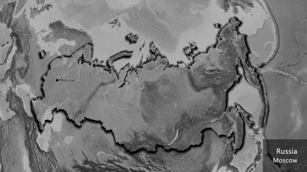 在一张灰色比例尺地图上对俄罗斯边境地区进行的密切监视 资本点 这个国家的边缘呈斜角状 国家及其首都的英文名称 — 图库照片