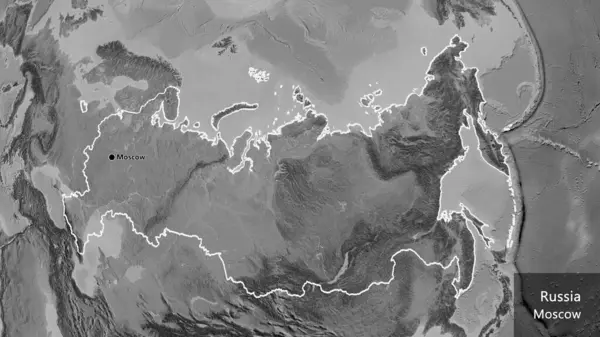在一张灰色比例尺地图上对俄罗斯边境地区进行的密切监视 资本点 概略地描述一下国家的面貌 国家及其首都的英文名称 — 图库照片