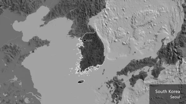 韩国边境地区的特写镜头 用一张双层地图上的黑暗阴影突出显示出来 资本点 概略地描述一下国家的面貌 国家及其首都的英文名称 — 图库照片