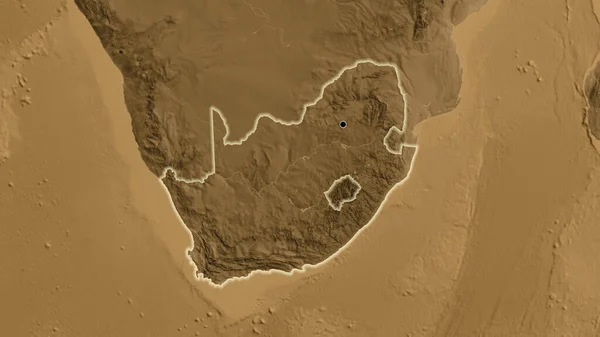 Close-up of the South Africa border area on a sepia elevation map. Capital point. Glow around the country shape.