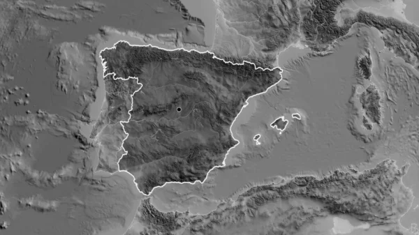 Close-up of the Spain border area highlighting with a dark overlay on a grayscale map. Capital point. Outline around the country shape.
