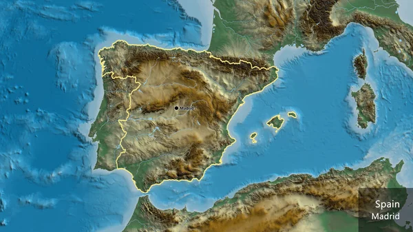 在一张救济地图上对西班牙边境地区进行了密切监视 资本点 概略地描述一下国家的面貌 国家及其首都的英文名称 — 图库照片