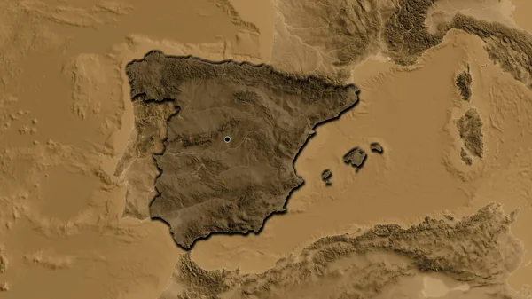 Close-up of the Spain border area highlighting with a dark overlay on a sepia elevation map. Capital point. Bevelled edges of the country shape.