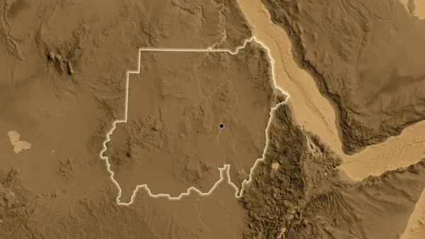 stock image Close-up of the Sudan border area on a sepia elevation map. Capital point. Glow around the country shape. 