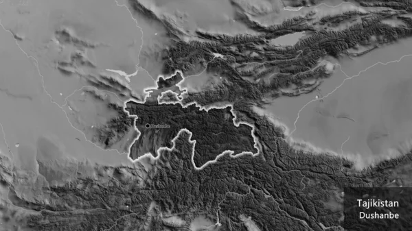 タジキスタン国境付近のクローズアップでは グレースケールの地図上に暗いオーバーレイが強調されています 資本ポイント 国の形の周りに光る 英名国とその首都 — ストック写真