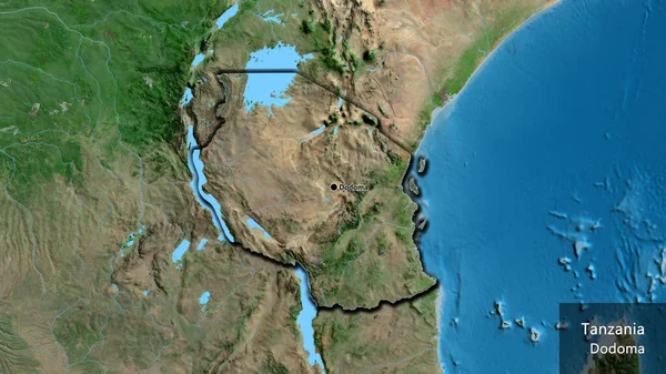 Tanzanya sınır bölgesinin uydu haritasında yakın plan görüntüsü. Ana nokta. Kırsal kesimin kıvrımlı kenarları. Ülkenin ve başkentinin İngilizce adı