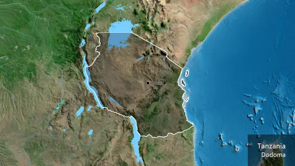 坦桑尼亚边境地区的特写镜头 用卫星地图上的黑暗覆盖突出显示 资本点 概略地描述一下国家的面貌 国家及其首都的英文名称 — 图库照片