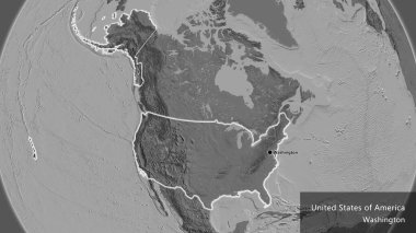 Amerika Birleşik Devletleri sınır bölgesinin bir bileklik haritasında yakın plan görüntüsü. Ana nokta. Ülke çapında parıldıyor. Ülkenin ve başkentinin İngilizce adı