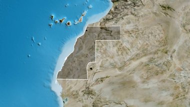 Batı Sahra sınır bölgesinin yakın çekimleri bir uydu haritasında koyu bir örtüyle vurgulanıyor. Ana nokta. Ülke şekli etrafında özet geç. 