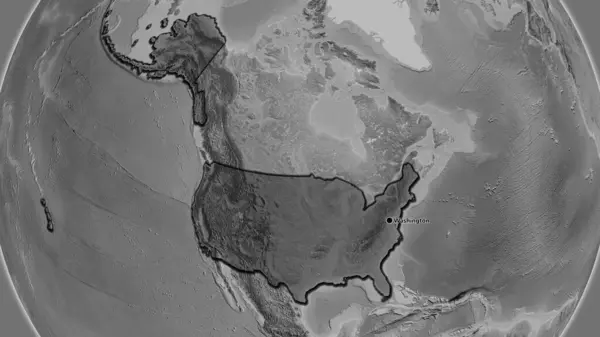 Close-up of the United States of America border area highlighting with a dark overlay on a grayscale map. Capital point. Bevelled edges of the country shape.