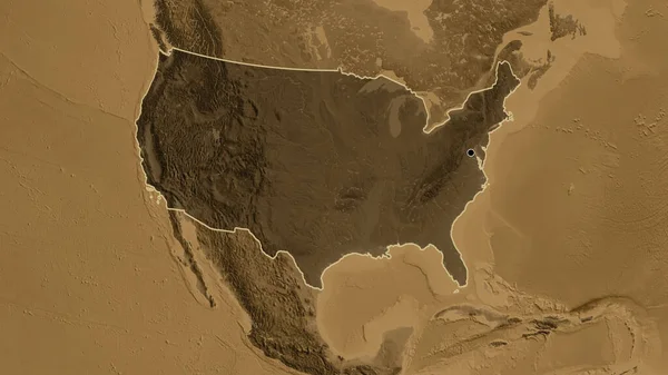 Close-up of the United States of America border area highlighting with a dark overlay on a sepia elevation map. Capital point. Outline around the country shape.