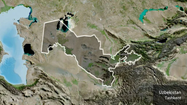 Close-up of the Uzbekistan border area highlighting with a dark overlay on a satellite map. Capital point. Glow around the country shape. English name of the country and its capital