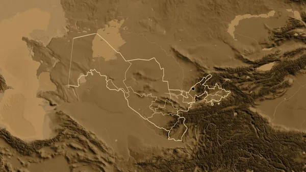 Close-up of the Uzbekistan border area and its regional borders on a sepia elevation map. Capital point. Outline around the country shape.