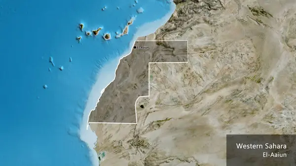 Close-up of the Western Sahara border area highlighting with a dark overlay on a satellite map. Capital point. Outline around the country shape. English name of the country and its capital