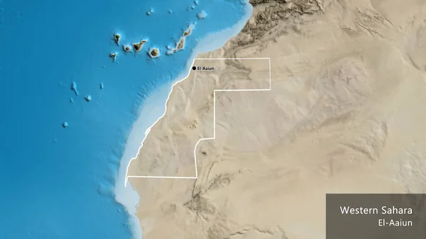 Close-up of the Western Sahara border area on a satellite map. Capital point. Outline around the country shape. English name of the country and its capital