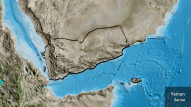 Yemen sınır bölgesinin uydu haritasında yakın plan görüntüsü. Ana nokta. Kırsal kesimin kıvrımlı kenarları. Ülkenin ve başkentinin İngilizce adı