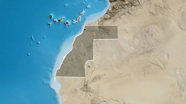 Close-up of the Western Sahara border area highlighting with a dark overlay on a satellite map. Capital point. Outline around the country shape.