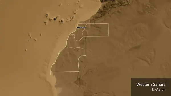 Close-up of the Western Sahara border area and its regional borders on a sepia elevation map. Capital point. Outline around the country shape. English name of the country and its capital