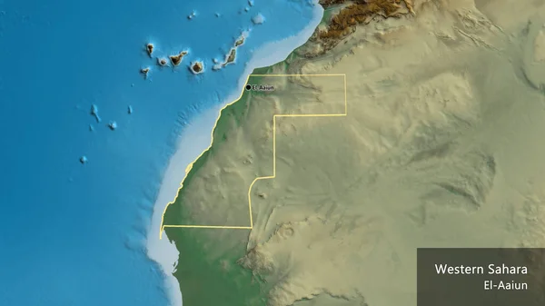 Close-up of the Western Sahara border area on a relief map. Capital point. Outline around the country shape. English name of the country and its capital