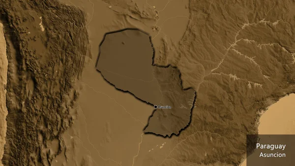 Close-up of the Paraguay border area highlighting with a dark overlay on a sepia elevation map. Capital point. Bevelled edges of the country shape. English name of the country and its capital