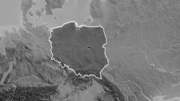 Close-up of the Poland border area highlighting with a dark overlay on a grayscale map. Capital point. Glow around the country shape.