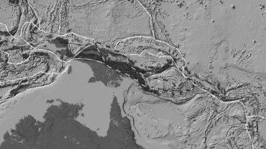 Woodlark tektonik plakasının alanı Patterson silindirik projeksiyonunda bilek yüksekliği haritasında çizilmiş bir çizgi ile işaretlenmiş.