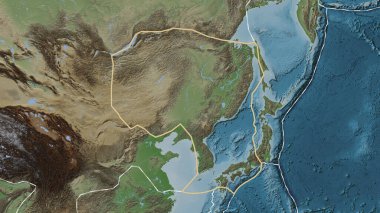 Amur tektonik plakasının Patterson silindirik projeksiyonunda soluk renkli bir yükseklik haritasında katı bir çizgi ile işaretlenmiş alanı