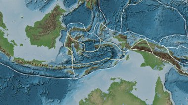 Banda Denizi tektonik tabakasının alanı Patterson silindir projeksiyonunda soluk renkli bir yükseklik haritasında katı bir çizgiyle işaretlenmiş.