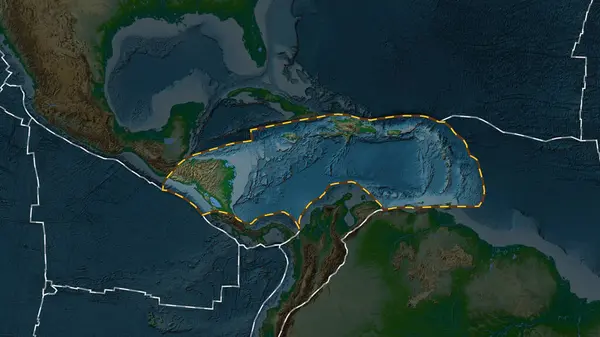 Area of the Caribbean tectonic plate marked with a dashed line against the background of a darkened colored elevation map in the Patterson Cylindrical projection