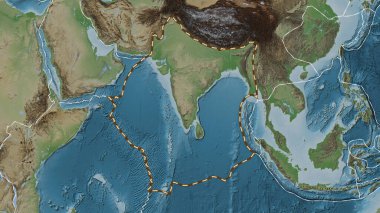 Hint tektonik plakasının alanı Fahey projeksiyonundaki soluk renkli yükseklik haritasında çizilmiş bir çizgi ile işaretlenmiş.