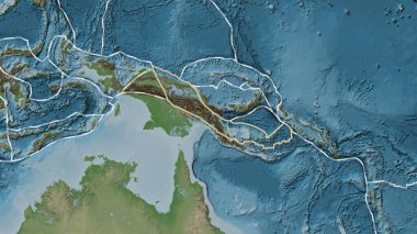 Woodlark tektonik plakasının alanı Fahey projeksiyonunda soluk renkli bir yükseklik haritasında katı bir çizgiyle işaretlenmiş.