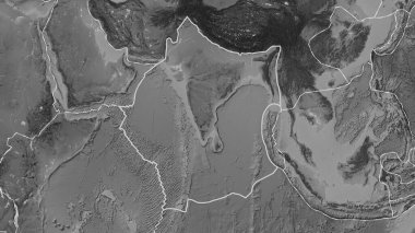 Hint tektonik plakasının alanı Fahey projeksiyonundaki gri tonlama yükseklik haritasında katı bir çizgi ile işaretlenmiş.