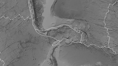 Scotia tektonik plakasının alanı Fahey projeksiyonundaki gri tonlama yükseklik haritasında katı bir çizgi ile işaretlenmiş.