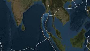 Burma tektonik plakasının alanı, Fahey projeksiyonundaki koyu renkli uydu görüntüleme haritasının arka planına çizilmiş bir çizgi ile işaretlenmiş.