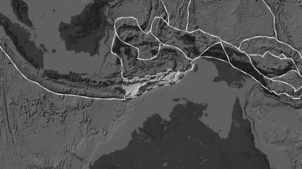 Timor tektonik plakasının alanı Fahey projeksiyonundaki koyu bir bilek yükseklik haritasının arka planına çizilmiş bir çizgi ile işaretlenmiştir.