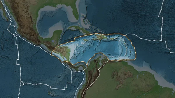 Area of the Caribbean tectonic plate marked with a dashed line against the background of a darkened pale colored elevation map in the Fahey projection