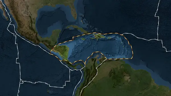 Area of the Caribbean tectonic plate marked with a dashed line against the background of a darkened satellite imagery map in the Fahey projection