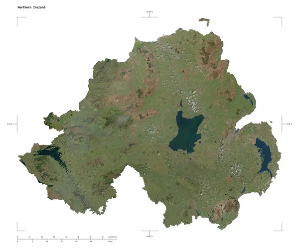 Stock image Shape of a high resolution satellite map of the Northern Ireland, with distance scale and map border coordinates, isolated on white