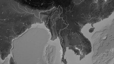 Myanmar, gölleri ve nehirleri olan gri tonlama yükseklik haritasında ana hatlarıyla belirtilmişti.
