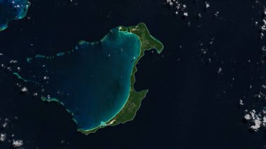 Ouvea Island in the Coral Sea on a satellite image taken in July 27, 2021 clipart