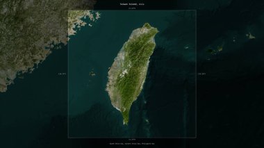 Taiwan Island in the Philippine Sea, belonging to Taiwan, described and highlighted on a satellite image taken in January 25, 2023 clipart