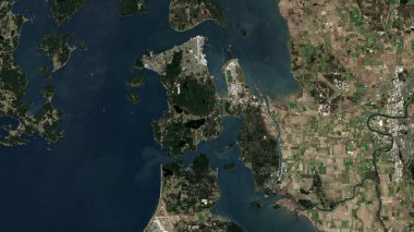 Fidalgo Island in the The Coastal Waters of Southeast Alaska and British Columbia on a satellite image taken in March 16, 2020 clipart