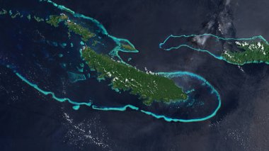 Vanatinai Island in the Coral Sea on a satellite image taken in May 7, 2021 clipart