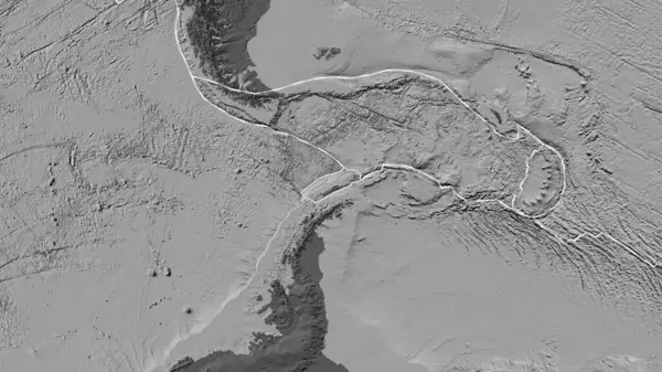 Shetland tektonik plakasının alanı Eckert III projeksiyonunda bir bilek yükseklik haritasında katı bir çizgi ile işaretlenmiştir.