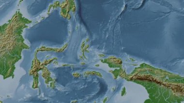 Halmahera Denizi. Patterson silindirik projeksiyonunda soluk renkli bir yükseklik haritasında konum diyagramı