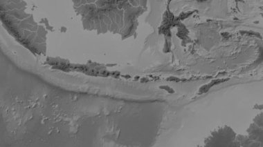 Patterson silindirik projeksiyonunda dünyanın gri ölçekli yükseklik haritasının arka planında Bali Denizi bölgesi